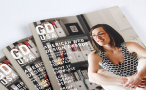 Photo of three Graphic Design USA magazines with the American Web Design Awards on the front cover.