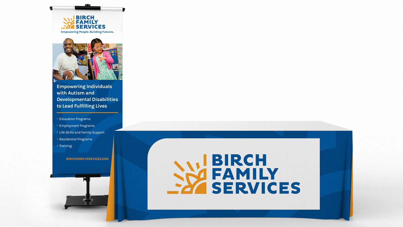 Birch Family Services table cover design and banner stand design