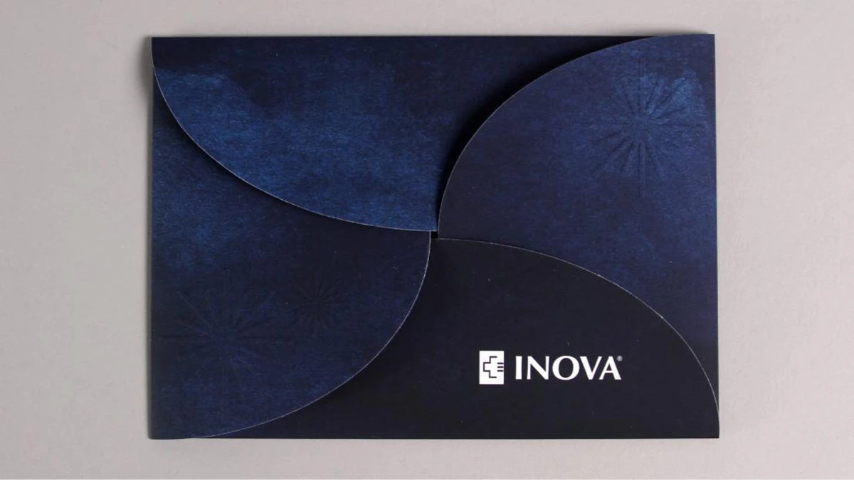 Gala event branding applied to the invitation package's petal enclosure envelope.