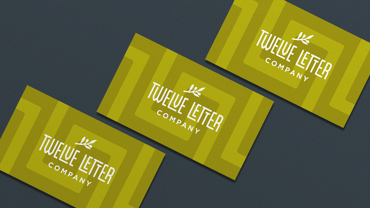 Twelve Letter logo, designed by Trillion, on three business cards