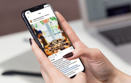 Tips for content marketing — a user on a phone looking at a post on Instagram