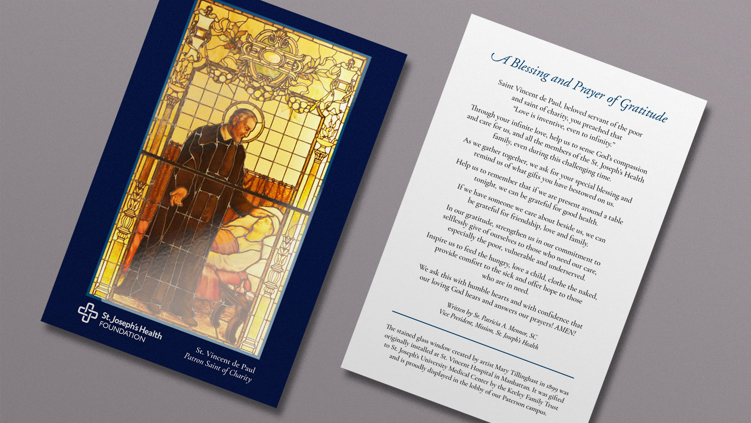 Prayer card with special UV coat on stained glass window