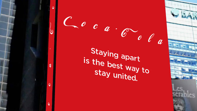 coca-cola logo spaced out for pandemic messaging