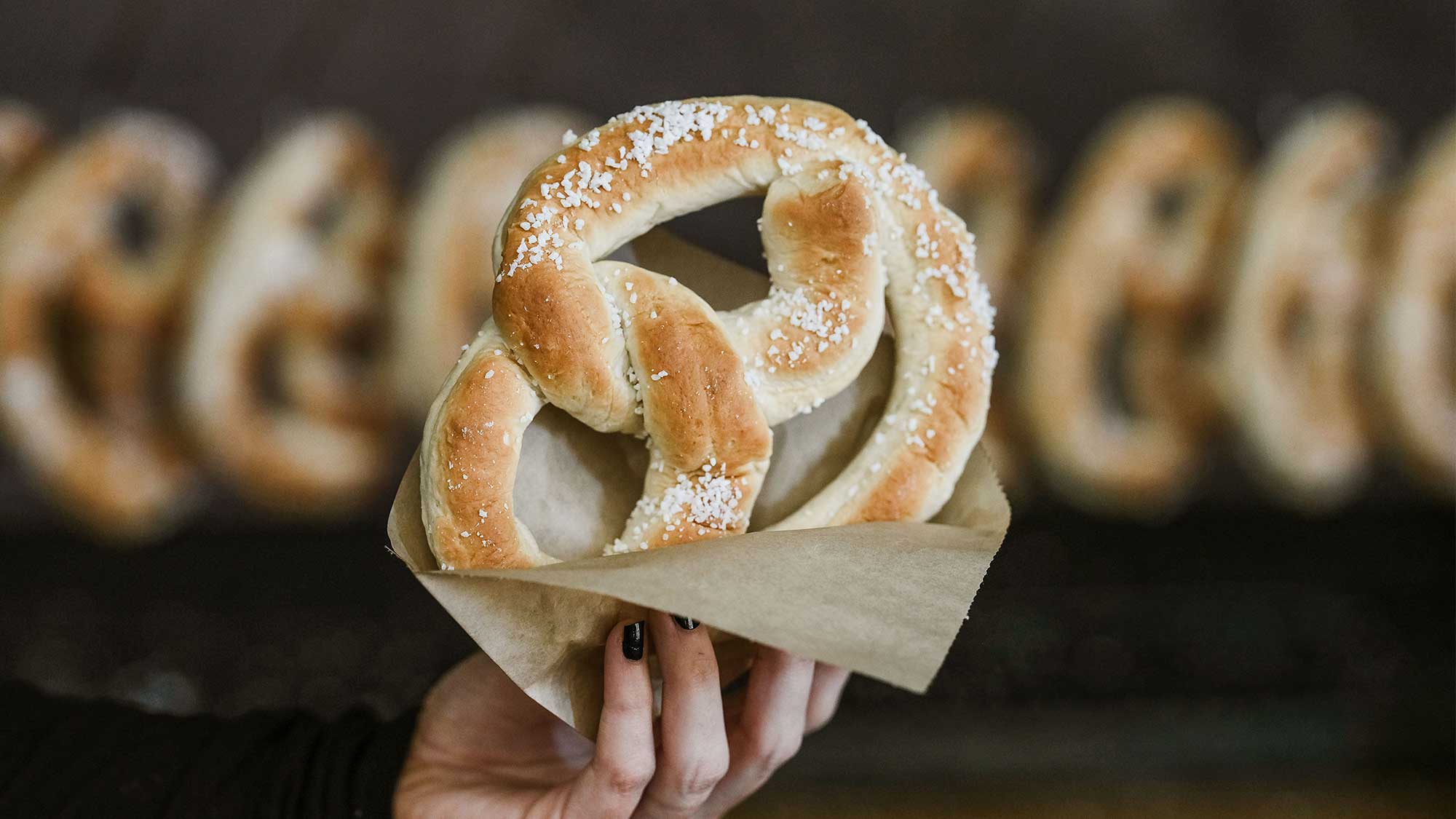 soft pretzel offered at a baseball stadium