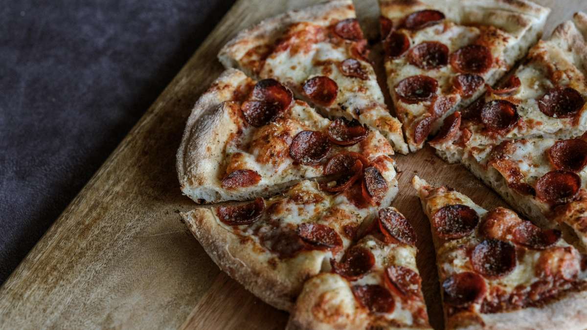 Pepperoni pizza served at Citi Field on a wooden board. Photo by Christina Zen.