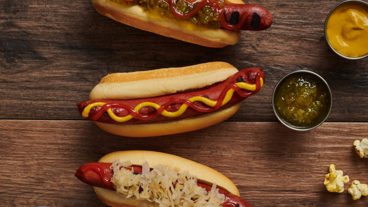 Hot dogs with mustard, relish and popcorn at Mercedes-Benz Stadium. Photo by Angie Webb, and food styling by Tami Hardeman.