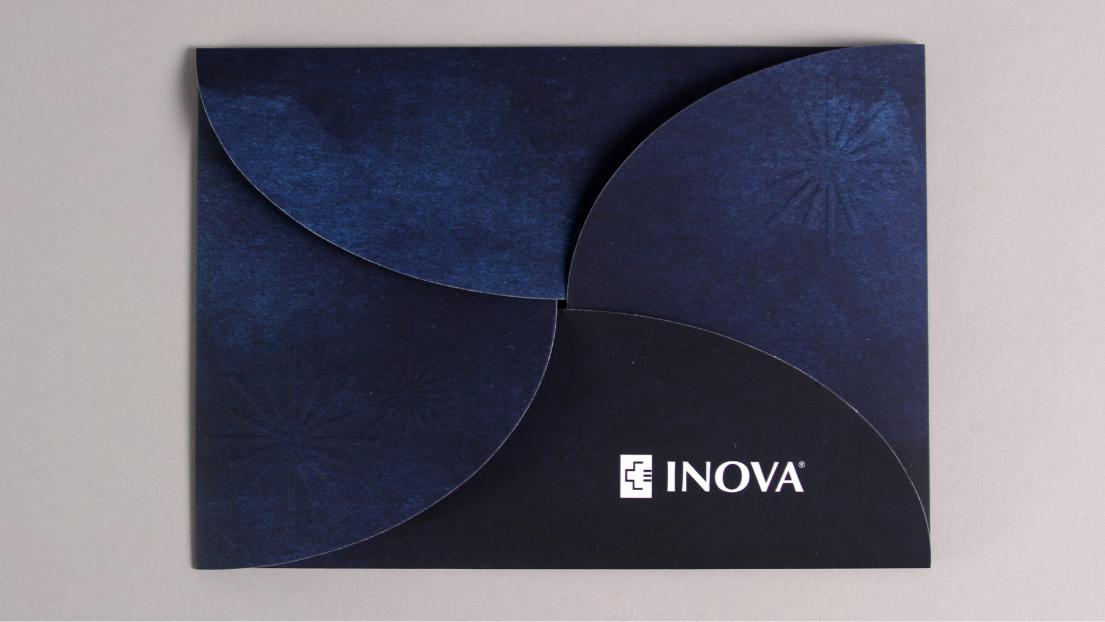 Gala event branding applied to the invitation package's petal enclosure envelope. 