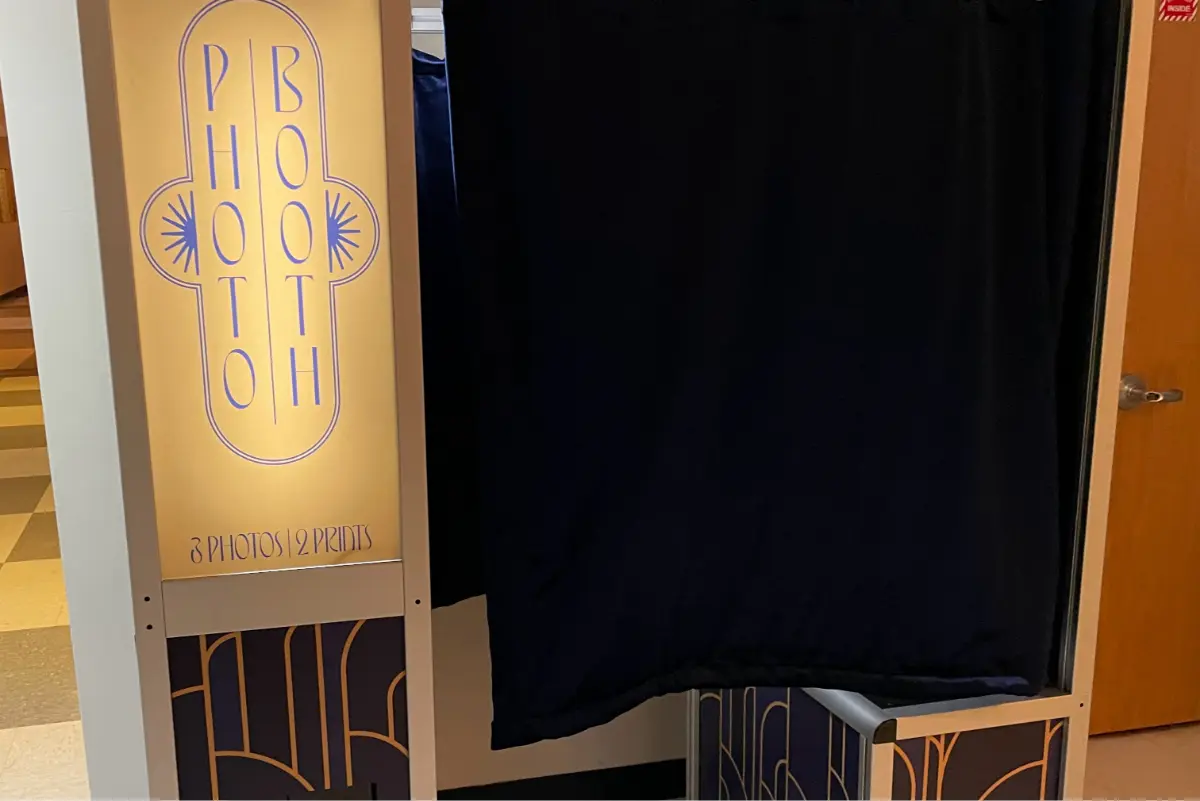 A photo of the Green Vale School photo booth for their centennial anniversary event called Party of the Century.