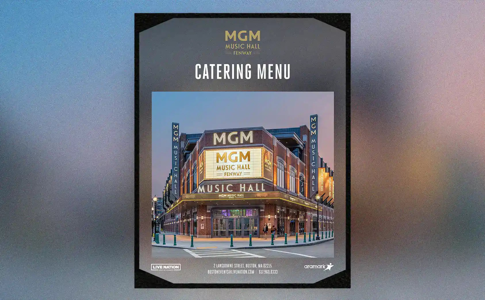 The front cover of the menu for MGM Music Hall on a blurry background.