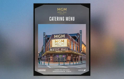 The front cover of the menu for MGM Music Hall on a blurry background.