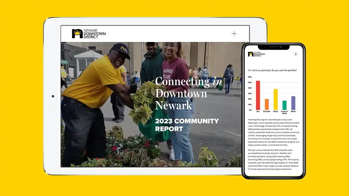 Tablet and mobile screens of the annual community report website design.