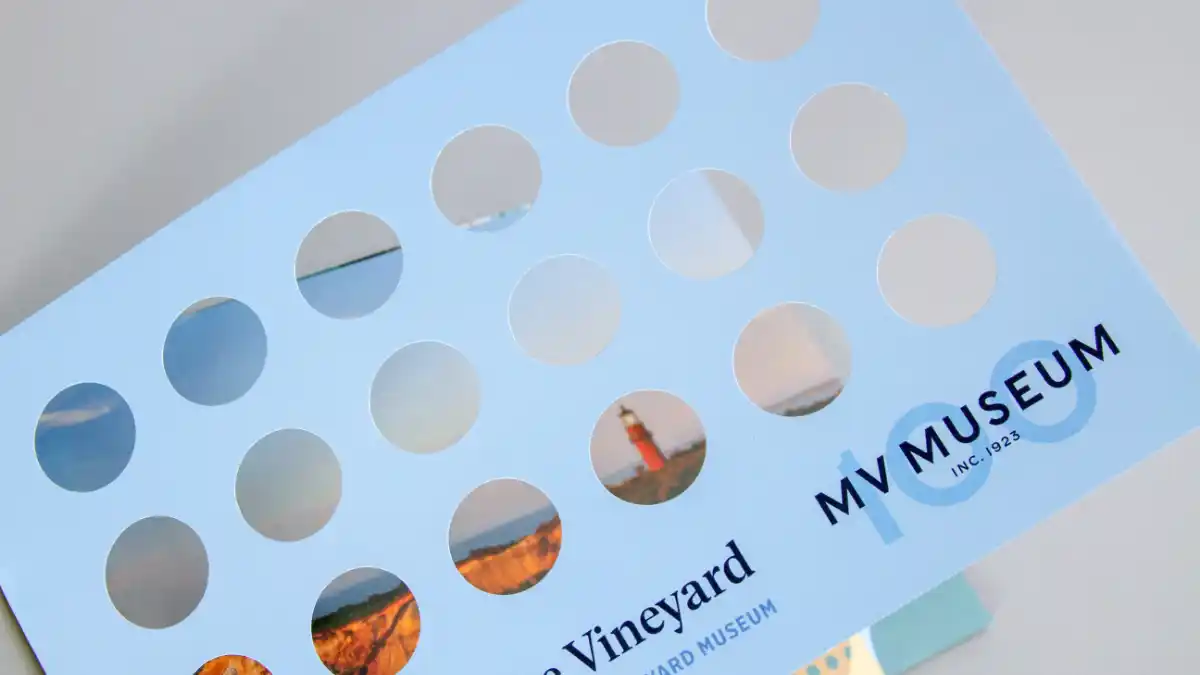 The cover of the Martha's Vineyard Museum campaign brochure featuring a die cut.