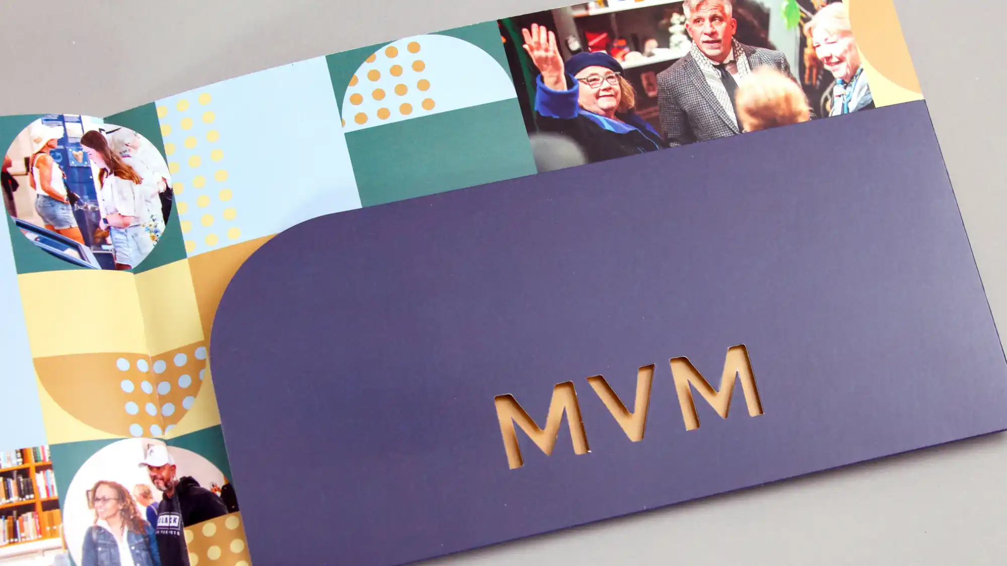 The die cut pocket folder of the MVM brochure.