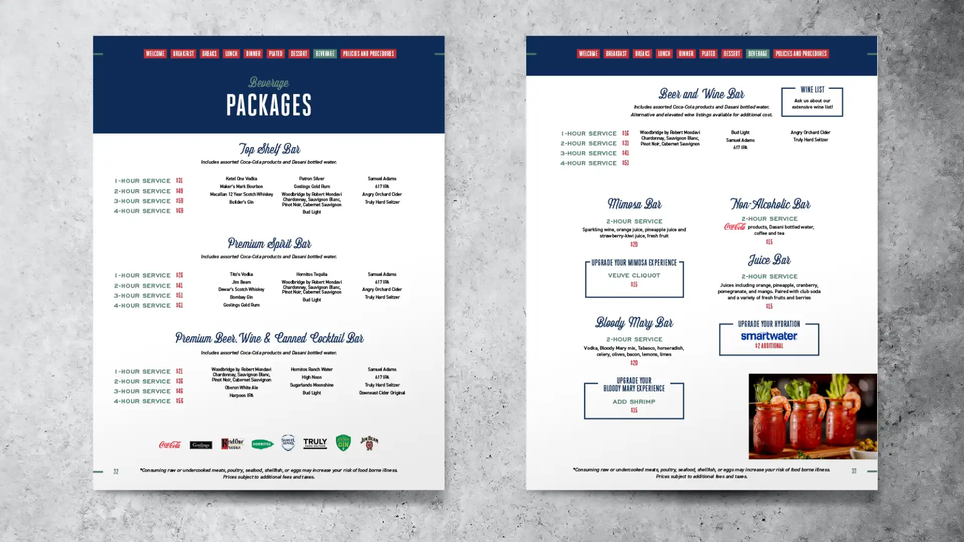 Two pages of the Fenway Park menu on a gray marble tabletop background, packages and beer and wine bar pages.